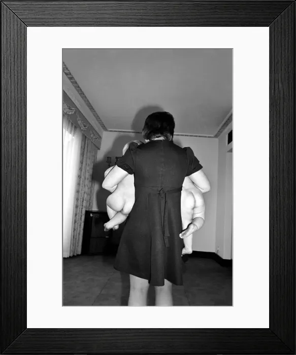 Framed Print : Two bundles of joy. A couple of babies at a babies and toddlers club are rounded up by