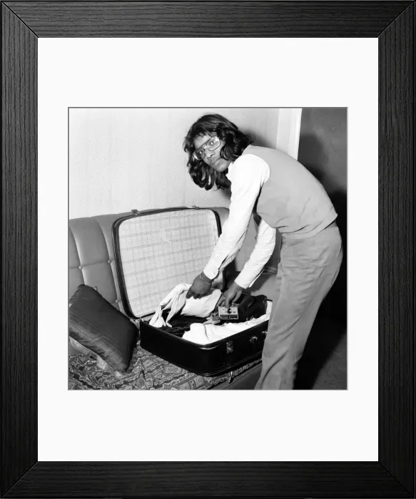 Framed Print : Teenager packing for his summer holiday. April 1975 75-2200 Framed Print : Teenager packing for his summer holiday. April 1975 75-2200