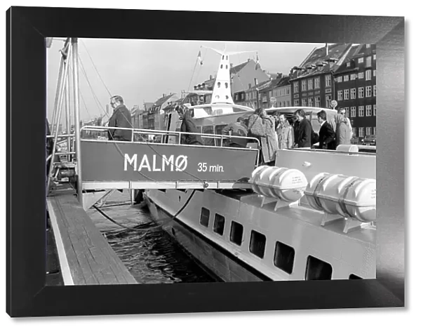 Passengers disembark from the Malmo (Sweden) hydrofoil at their final destination
