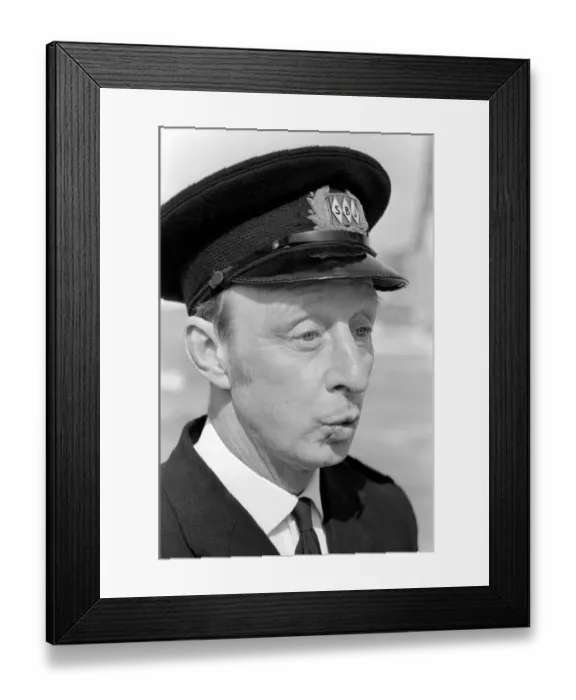 Framed Print : Man watching Beach Fashion at Blackpool. March 1975 75-1705-013 Framed Print : Man watching Beach Fashion at Blackpool. March 1975 75-1705-013