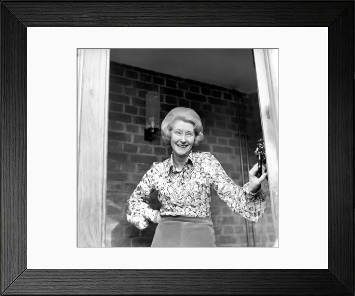 Framed Print : Mrs. Babette Barber looking out of her window. April 1975 75-2155 Framed Print : Mrs. Babette Barber looking out of her window. April 1975 75-2155