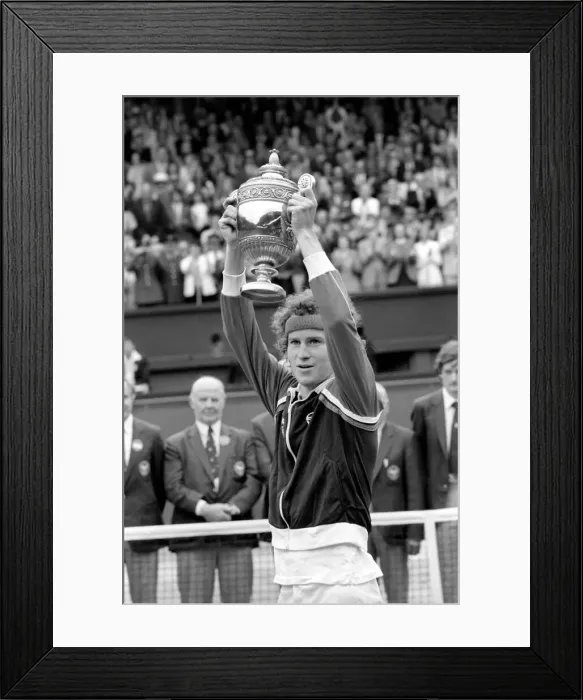 Framed Print : Wimbledon Tennis: Mens Finals 1981: John McEnroe shows of the golden trophy to Framed Print : Wimbledon Tennis: Mens Finals 1981: John McEnroe shows of the golden trophy to