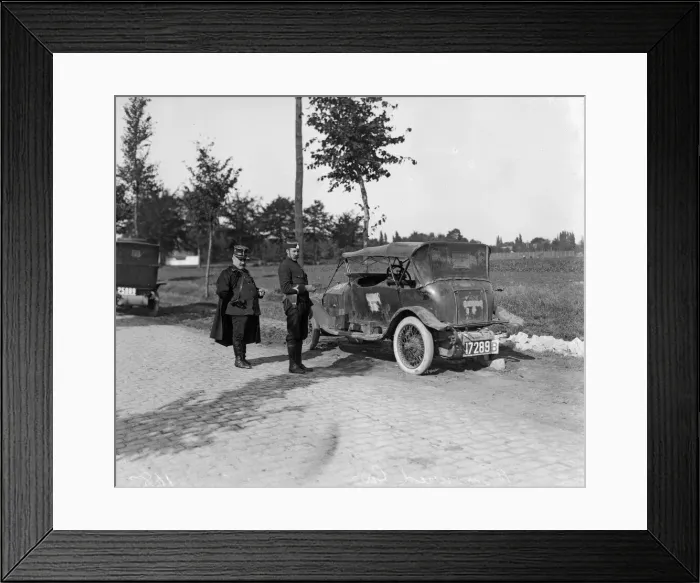 Framed Print : Belgium officers inspect a staff car which had been captured by the Germans along with Framed Print : Belgium officers inspect a staff car which had been captured by the Germans along with