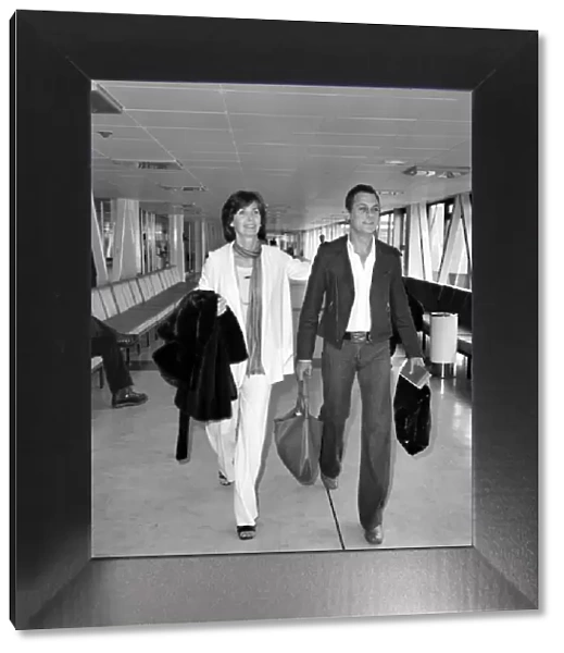 American film actor Tony Curtis and wife Lesley at Heathrow airport