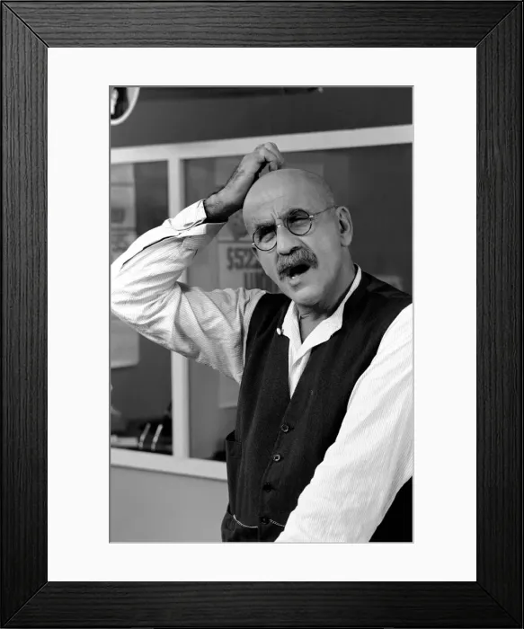Framed Print : Warren Mitchell scratches his head trying to decide which team he wants to win the cup Framed Print : Warren Mitchell scratches his head trying to decide which team he wants to win the cup