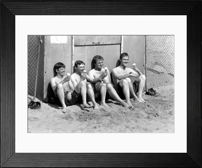 Framed Print : Four men sitting enjoying an ice cream in the hot weather at Margate Beach Framed Print : Four men sitting enjoying an ice cream in the hot weather at Margate Beach