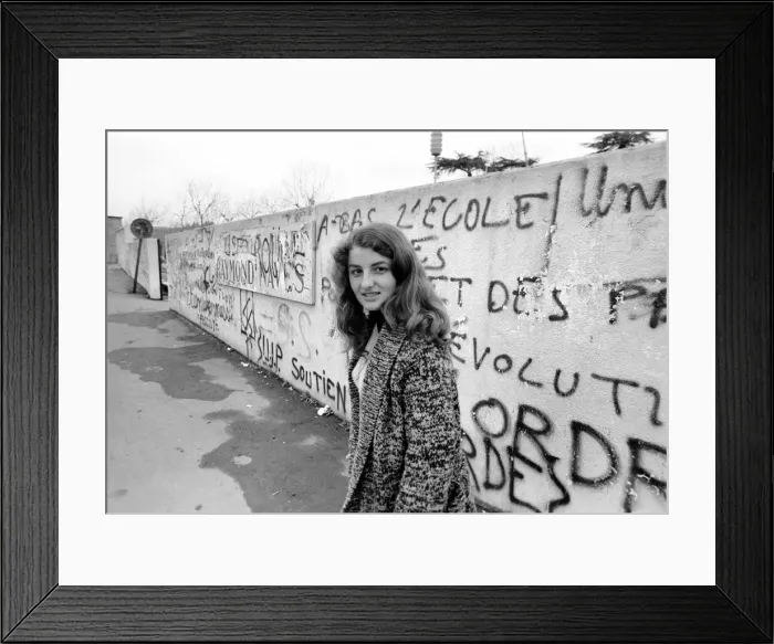 Framed Print : French teenager Marie Quaranta aged 15 outside her school that has 3, 000 pupils in St