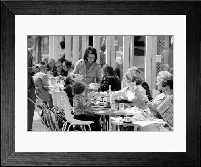 Framed Print : The Cafe life of Paris on Sunday afternoon at the Champs Elysees
