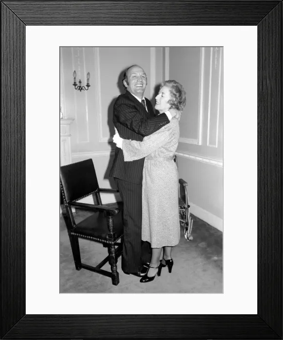 Framed Print : Henry Cooper is the patient and Dame Nurse'Vera Lynn helps him out Framed Print : Henry Cooper is the patient and Dame Nurse'Vera Lynn helps him out