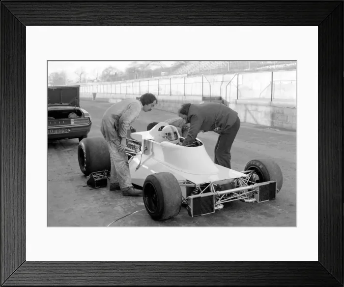 Framed Print : Racing driver John Surtees trying his new car. January 1976 76-00088-005 Framed Print : Racing driver John Surtees trying his new car. January 1976 76-00088-005