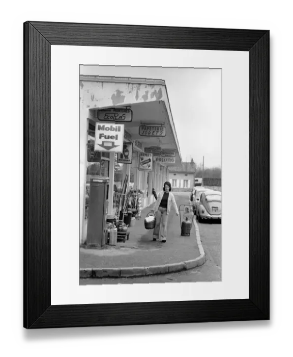 Framed Print : French housewife Mrs. Maria Quaranta with her heavy food basket after doing the shopping Framed Print : French housewife Mrs. Maria Quaranta with her heavy food basket after doing the shopping