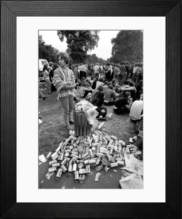 Framed Print : Hyde Park Pop Festival. Soft drink cans stacked by audience members at the concert Framed Print : Hyde Park Pop Festival. Soft drink cans stacked by audience members at the concert