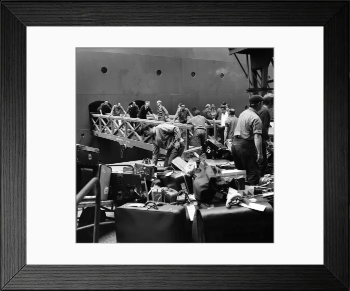 Framed Print : Southampton Docks: Shore and office staff of Cunard, loading baggage onto Q. E Framed Print : Southampton Docks: Shore and office staff of Cunard, loading baggage onto Q. E