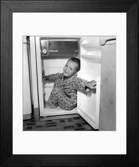 Framed Print : Humour: Unusual: Boy trapped in fridge. July 1970 70-6760-003 Framed Print : Humour: Unusual: Boy trapped in fridge. July 1970 70-6760-003