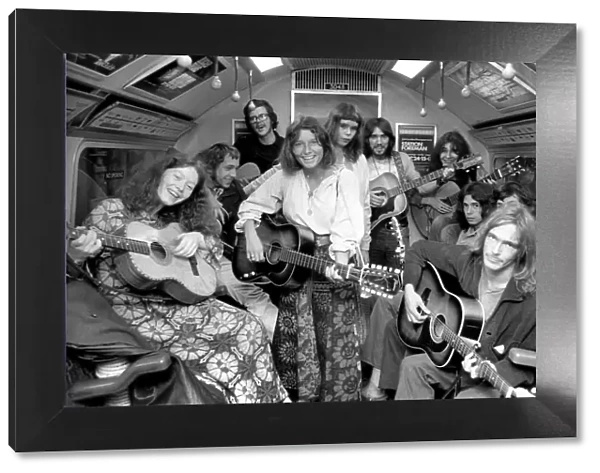 Music: Underground Pop Group: Underground singers on a Victoria line train