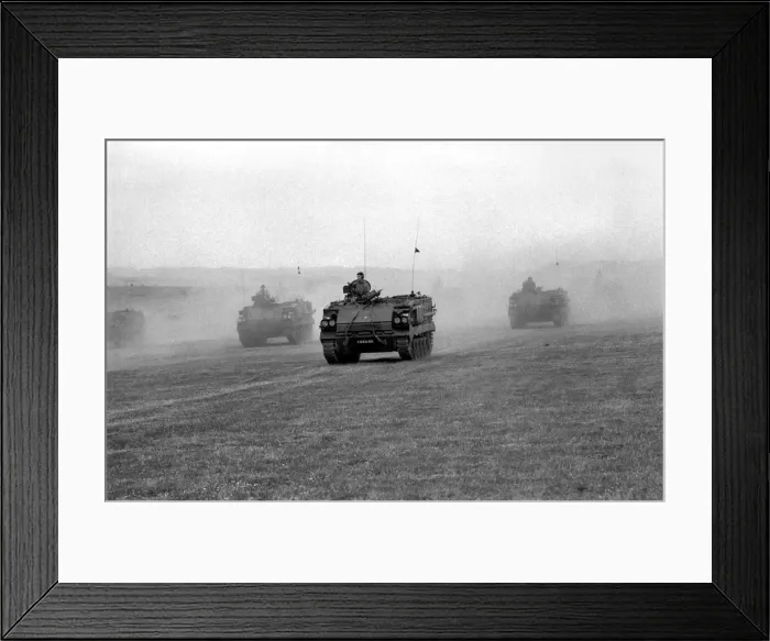 Framed Print : 50 years of Gunnery Anniversary: Two soldiers sweep the seats in readiness for Saturdays Framed Print : 50 years of Gunnery Anniversary: Two soldiers sweep the seats in readiness for Saturdays