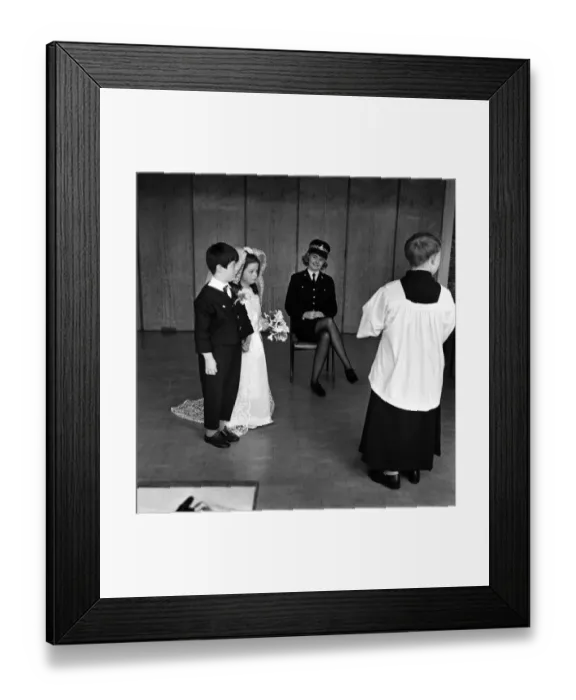 Framed Print : Children wedding has police guard: Police guard for child bride wearing Pilkington