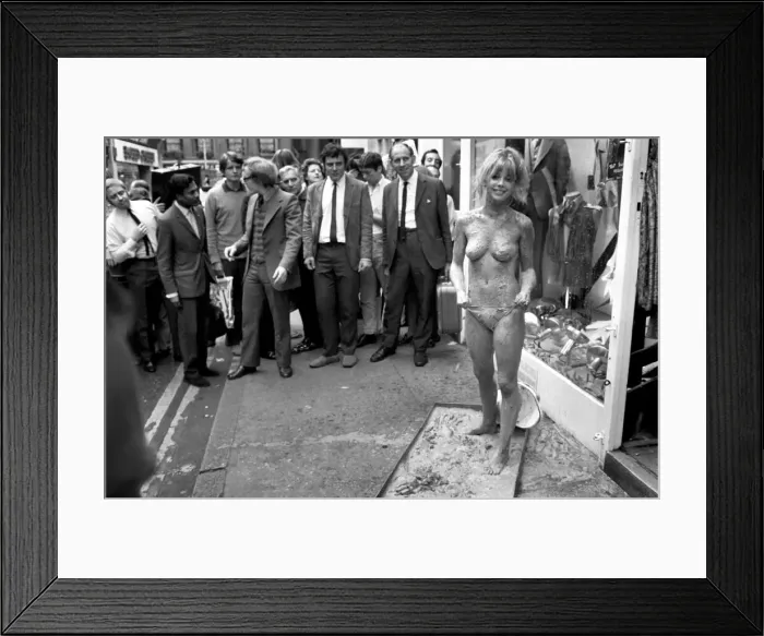 Framed Print : Glamour: Unusual: Helen Jones lies in tray of cement (Carol)