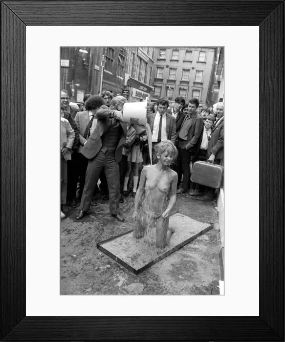 Framed Print : Glamour: Unusual: Helen Jones lies in tray of cement (Carol)