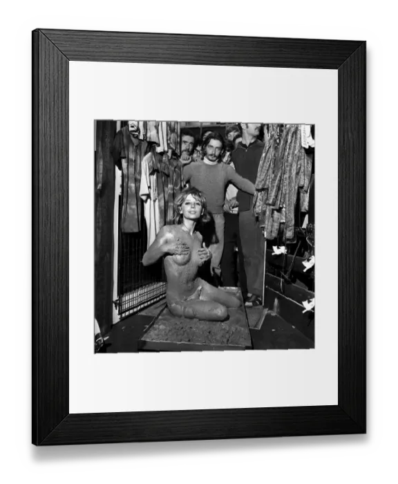 Framed Print : Glamour: Unusual: Helen Jones lies in tray of cement (Carol) Framed Print : Glamour: Unusual: Helen Jones lies in tray of cement (Carol)