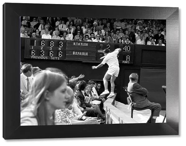 Wimbledon Tennis Championships 1970 1st Day. B. Fairlie rushes to get to shot by Taylor