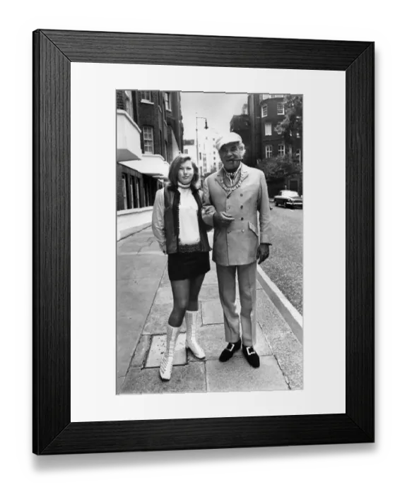 Framed Print : Lionel Stander andfFiancee in London today. July 1968 P008092 Framed Print : Lionel Stander andfFiancee in London today. July 1968 P008092