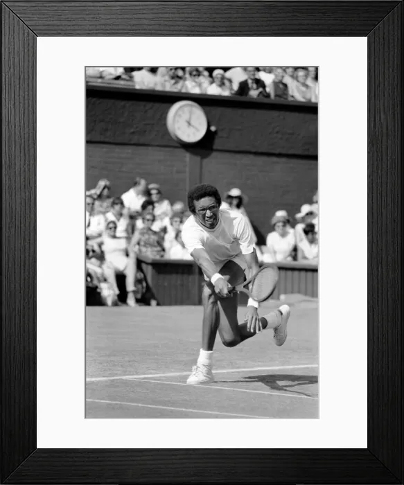 Framed Print : Wimbledon Tennis Championships 1970 1st Day. A. Ashe of America in action against Framed Print : Wimbledon Tennis Championships 1970 1st Day. A. Ashe of America in action against
