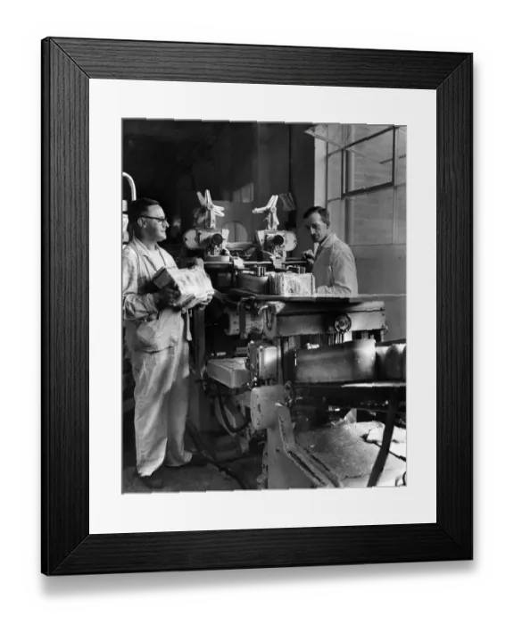 Framed Print : The Bakery. The machine that slices and wraps the bread at the Champion bakery before