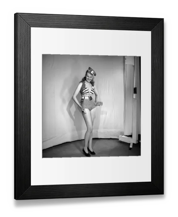 Framed Print : Woman wearing fancy dress bus condutors uniform. 1959