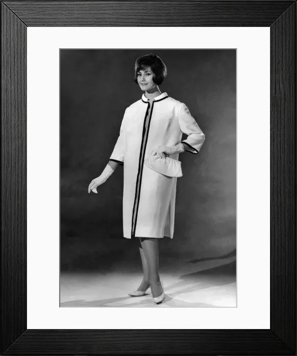 Framed Print : Reveille Fashions: Geraldine Hill modeling a elegant white evening coat with matching Framed Print : Reveille Fashions: Geraldine Hill modeling a elegant white evening coat with matching