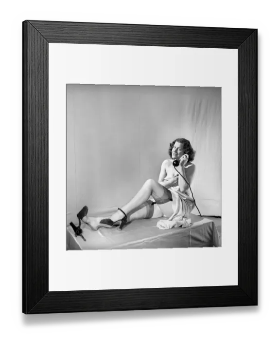 Framed Print : Woman wearing stockings seen here on the telephone. 1959 Framed Print : Woman wearing stockings seen here on the telephone. 1959