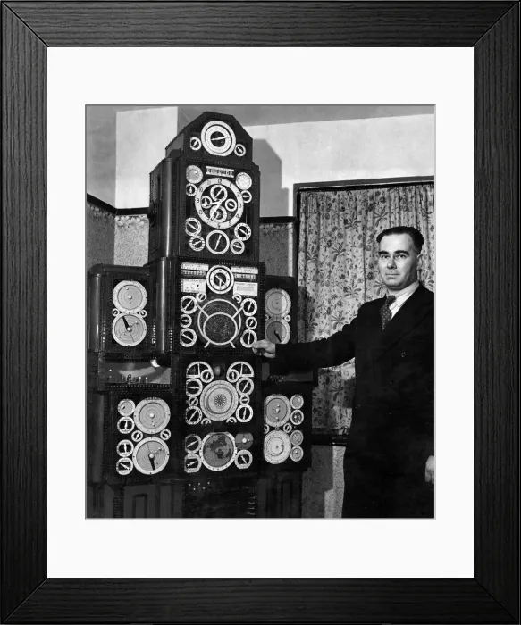 Framed Print : Mr. John Nowlan with his Astronomical clock. April 1952 P006328 Framed Print : Mr. John Nowlan with his Astronomical clock. April 1952 P006328