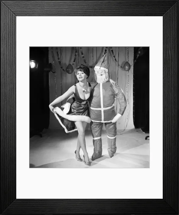 Framed Print : Model Kim Tracy seen here dressed for the office Christmas Party. 1960 E479-013 Framed Print : Model Kim Tracy seen here dressed for the office Christmas Party. 1960 E479-013