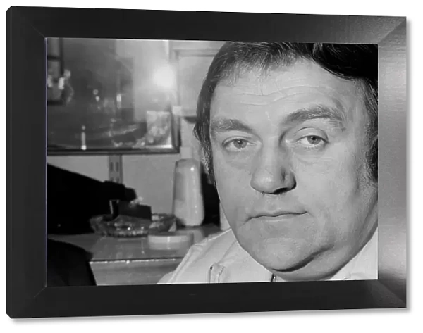 Comedian Les Dawson relaxing in his dressing room at Yorkshire Television studios