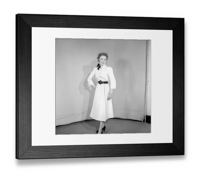 Framed Print : Clothing: Fashion: Coats. Woman wearing full length coat. 1956 B133-001 Framed Print : Clothing: Fashion: Coats. Woman wearing full length coat. 1956 B133-001