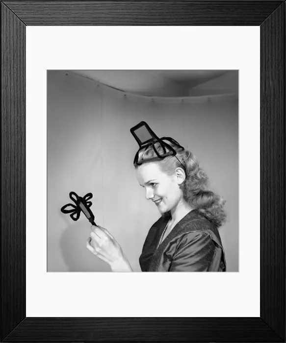 Framed Print : Model Hilda Moray wearing unusual Easter bonnet. March 1953