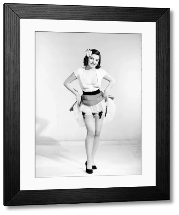 Framed Print : Model showing off tights and suspenders. 1966 Framed Print : Model showing off tights and suspenders. 1966