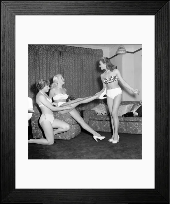 Framed Print : Three showgirls limber up in their digs before a performance. 1959 E09-004
