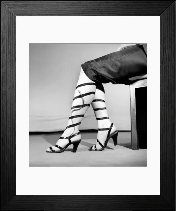 Framed Print : Woman wearing strappy shoes and snake. 1955 B124 Framed Print : Woman wearing strappy shoes and snake. 1955 B124