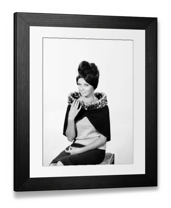 Framed Print : Clothing: Fashion: Hats: Woman wearing fur edged shrug wrap. 1962 B1544-030