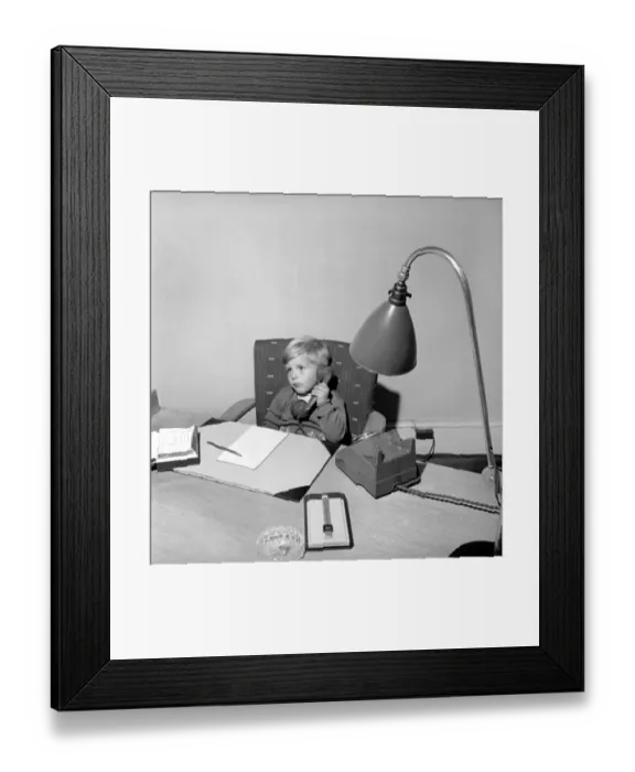 Framed Print : Office Junior: Two year old boy helps out at the offices of Theobald and son. 1957 Framed Print : Office Junior: Two year old boy helps out at the offices of Theobald and son. 1957