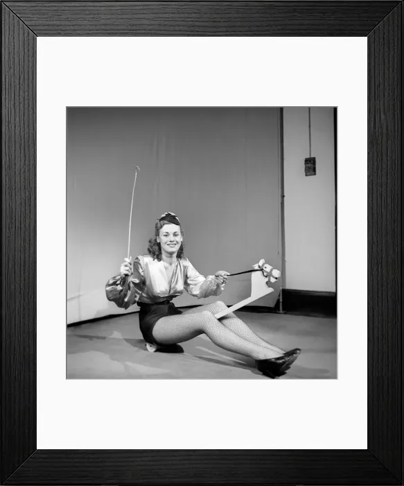 Framed Print : Woman wearing fancy dress jockey outfit. 1959 Framed Print : Woman wearing fancy dress jockey outfit. 1959
