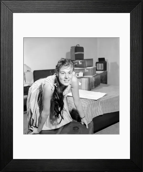 Framed Print : Holiday Packing: Gwendolen Tulley deciding what to pack for her adventure holiday Framed Print : Holiday Packing: Gwendolen Tulley deciding what to pack for her adventure holiday