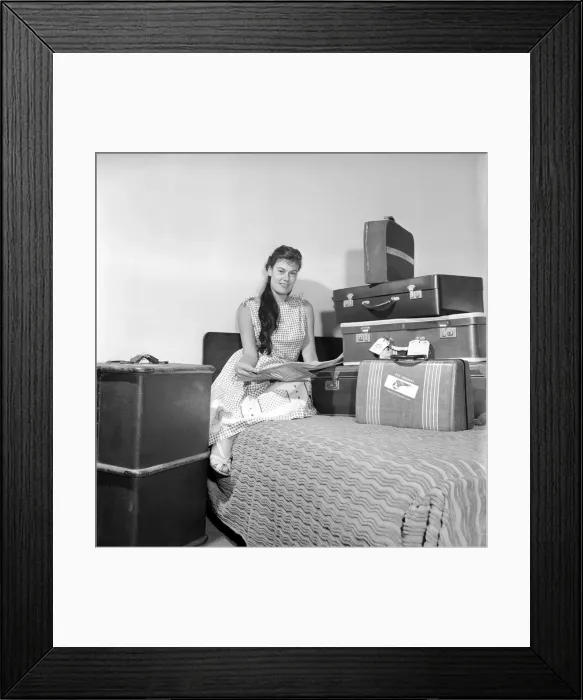 Framed Print : Holiday Packing: Gwendolen Tulley deciding what to pack for her adventure holiday