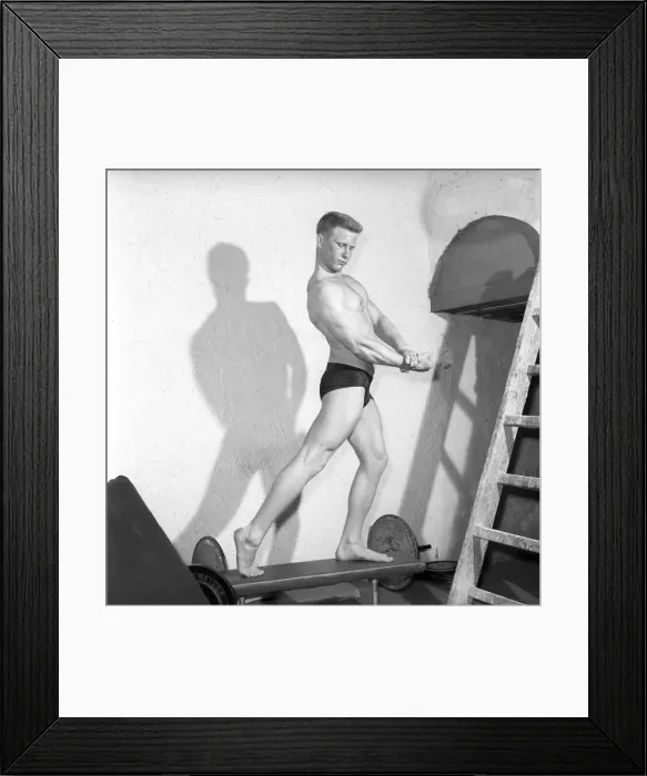 Framed Print : Mens Health: Body builder Larry Stevens seen here posing in the gym. 1957