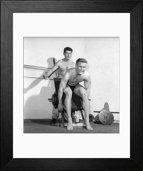 Framed Print : Mens Health: Body builder Larry Stevens seen here with his training coach exercising Framed Print : Mens Health: Body builder Larry Stevens seen here with his training coach exercising