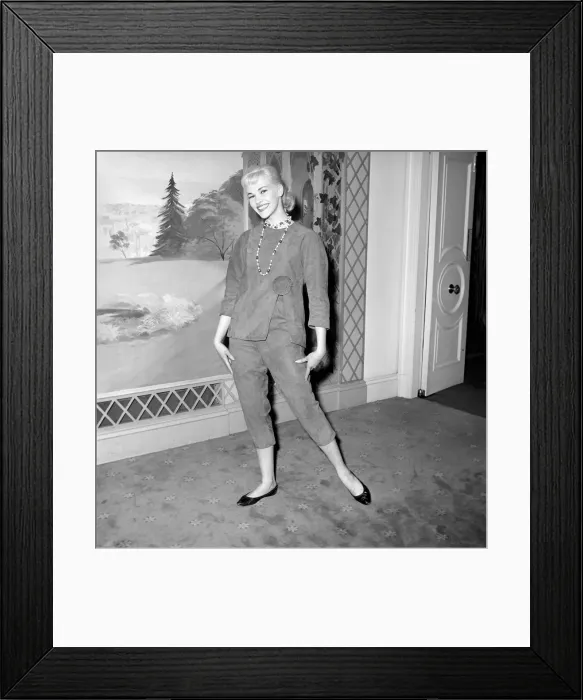 Framed Print : Clothing: Fashion: Leather. Woman modelling leather coats at fashion show