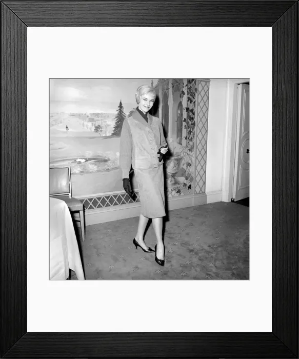 Framed Print : Clothing: Fashion: Leather. Woman modelling leather coats at fashion show