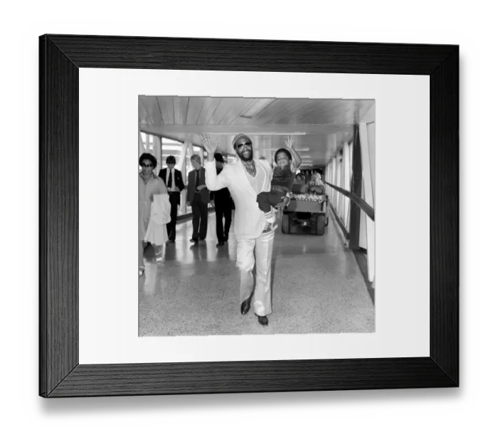 Framed Print : Marvin Gaye, singer with his son Frankie, aged 4, arriving at London Heathrow Airport Framed Print : Marvin Gaye, singer with his son Frankie, aged 4, arriving at London Heathrow Airport