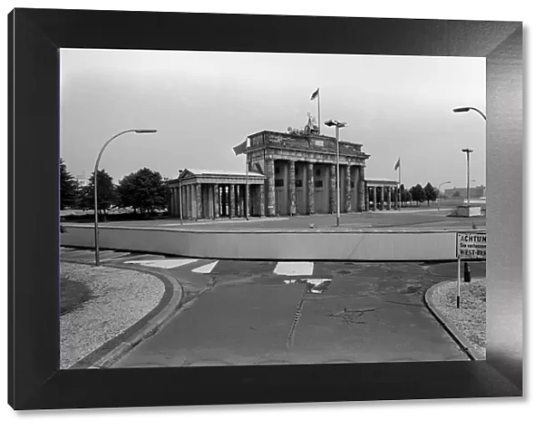 View of the Berlin Wall near the Brandenburg gate. The Berlin Wall was a barrier